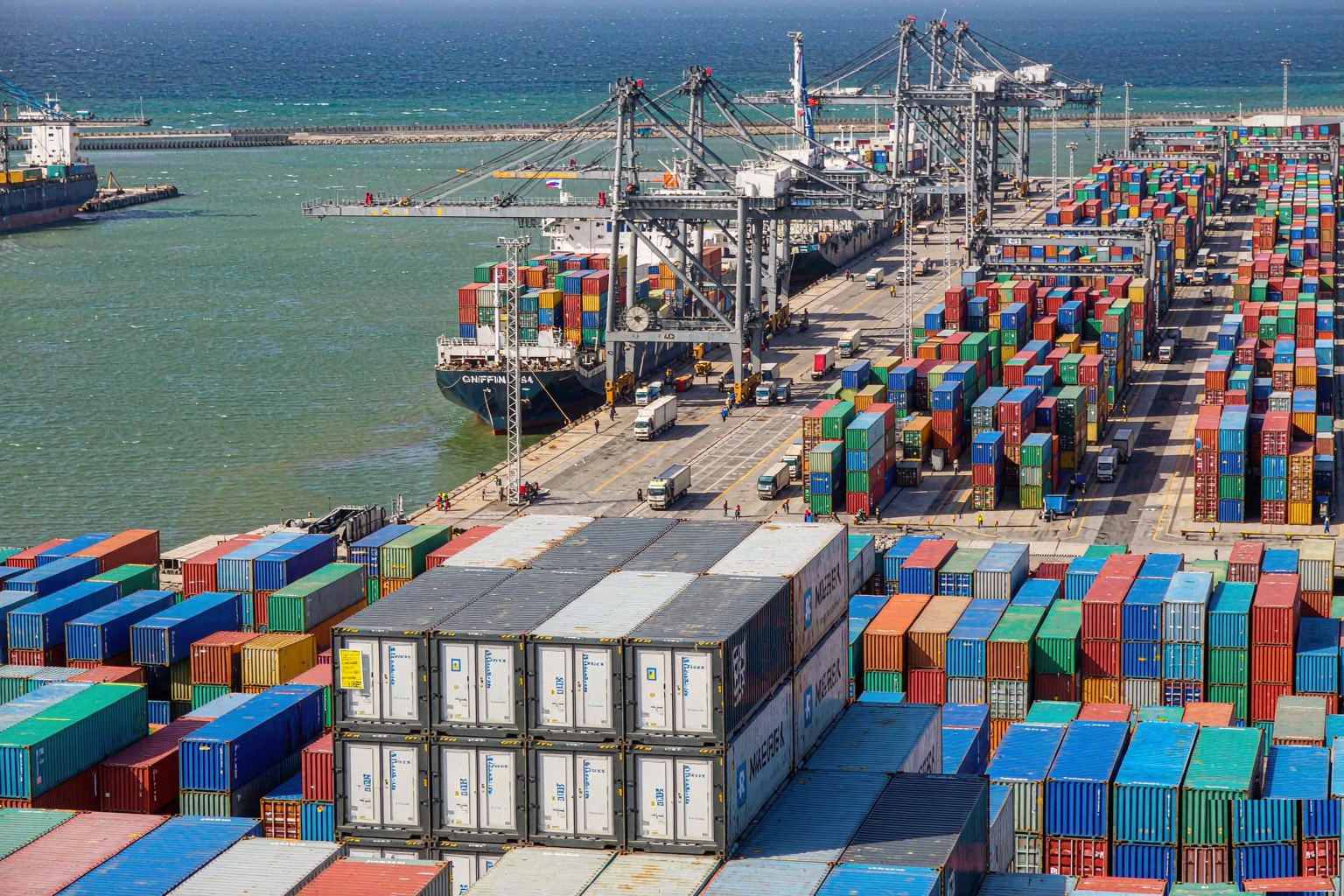Global port logistics at dusk